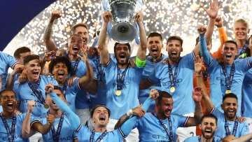 Photo: Man City win first Champions League title, complete treble